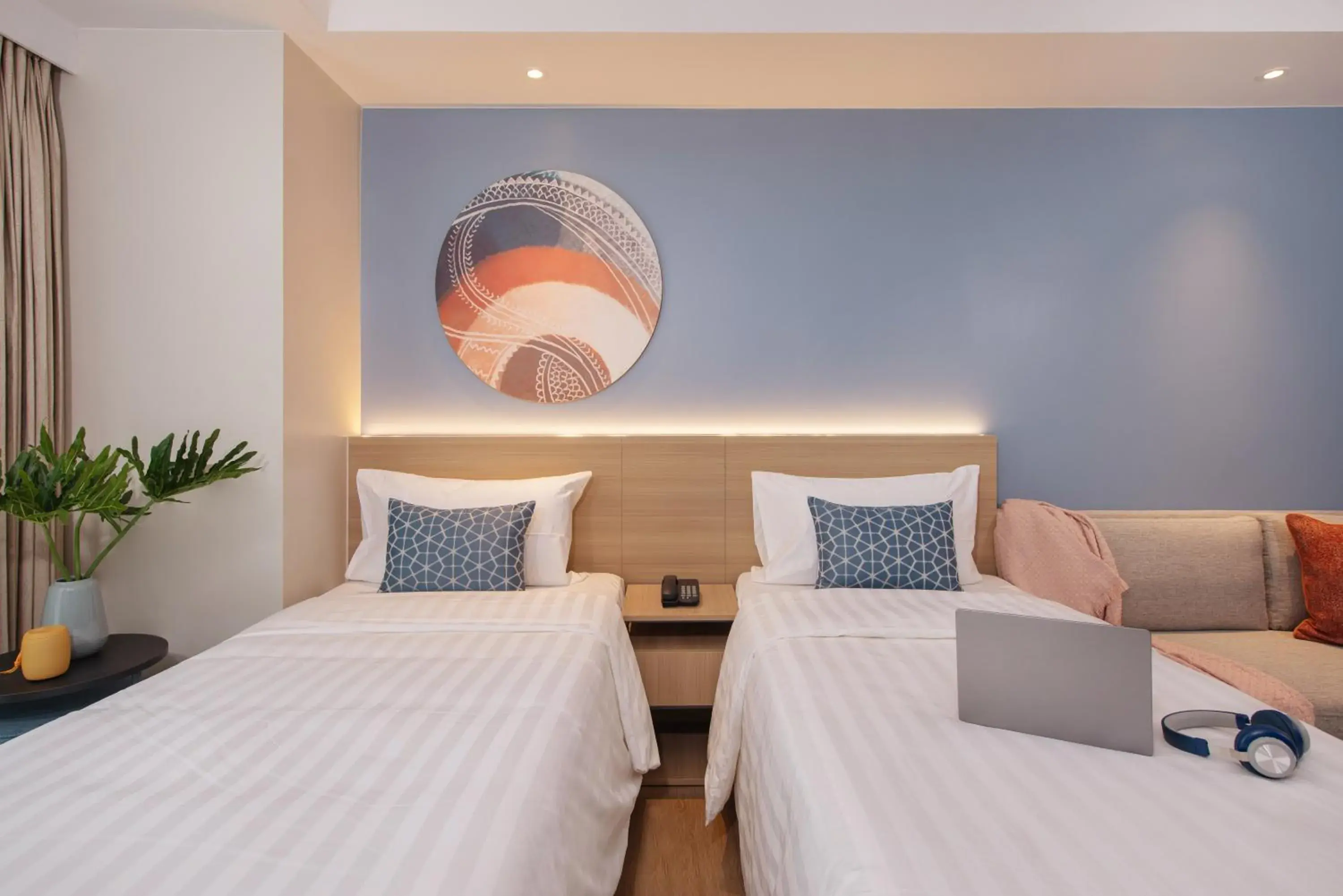 Bed in Citadines Roces Quezon City